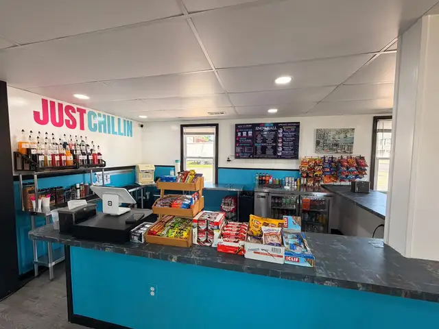 Wide view of the Just Chillin service counter and menu board